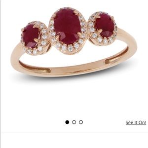 Three stone Kay’s natural ruby and diamond ring set in 14 k rose gold.